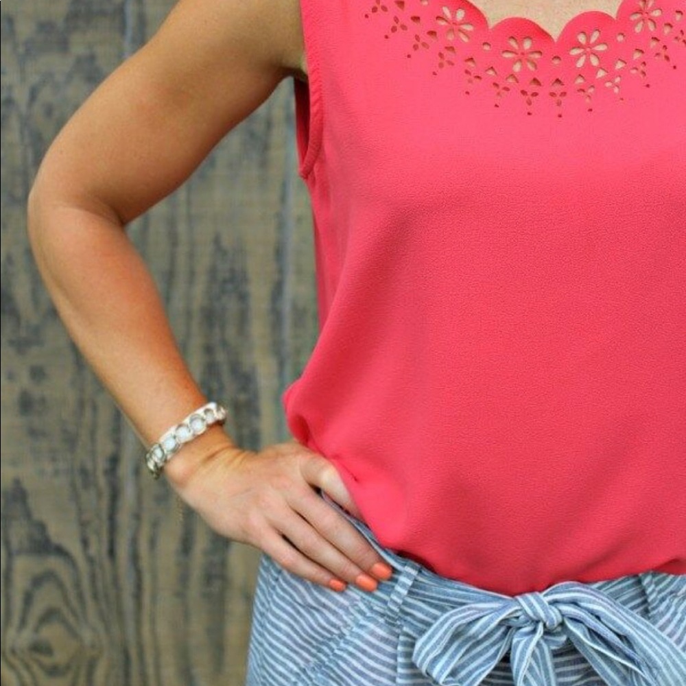 Shirt with laser cut trim around collar